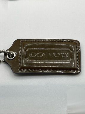 COACH Patent Leather Hang Tag Brown and Iridescent Gray